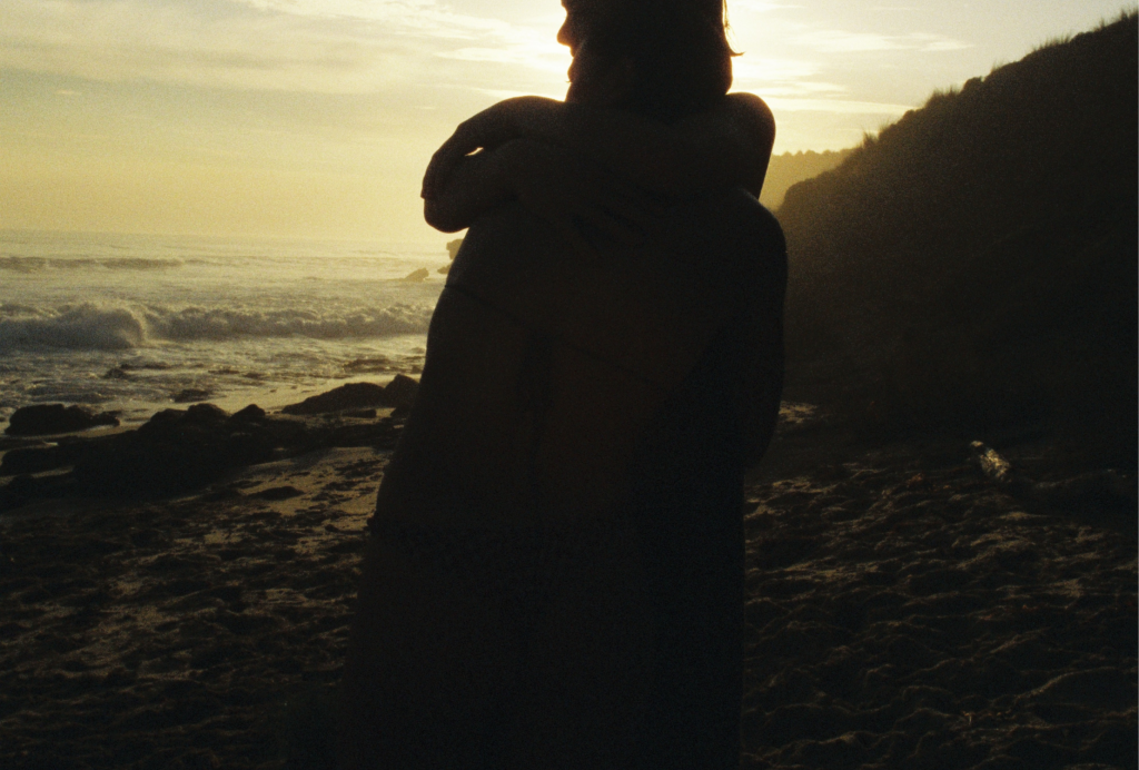 Silhouette girl at sunset