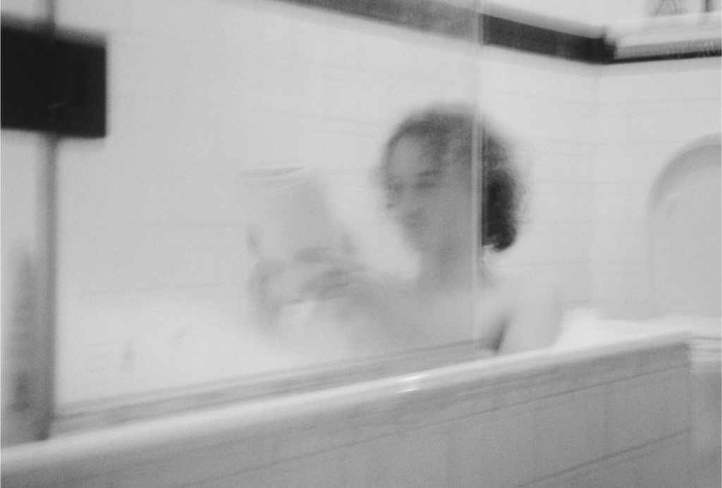 Black and white person in bath