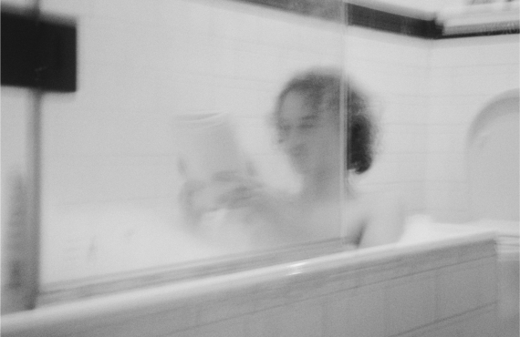 Black and white person in bath