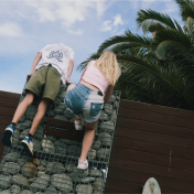 Climbing wall young couple 2