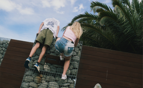 Climbing wall young couple 2