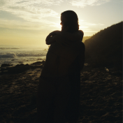 Silhouette girl at sunset