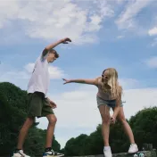 Young couple balancing