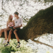 Zoomed out couple in tree